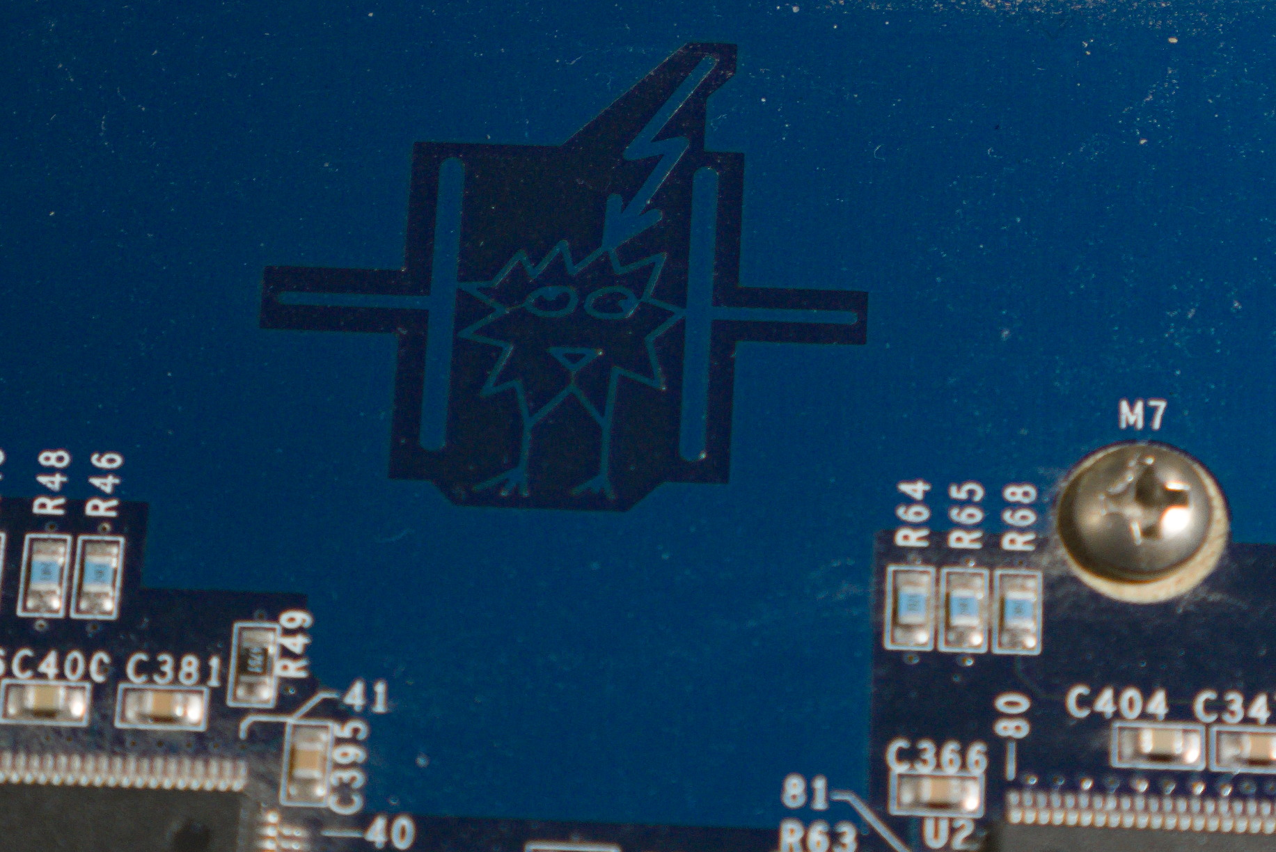 Photo of what appears to be a creature trapped between two plates of a capacitor